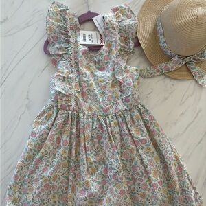 Floral dress perfect for Easter or Blossoming into spring time? **Hat Included!